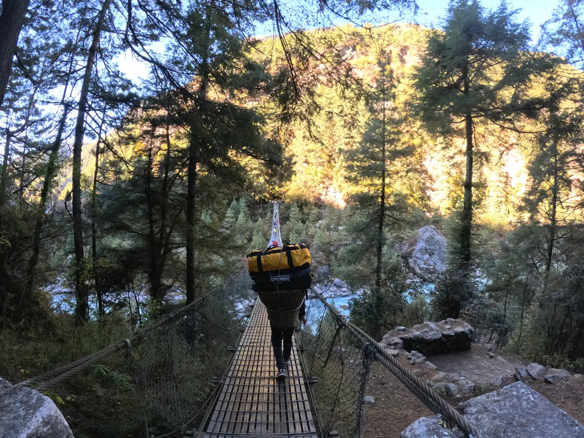 Crossing suspension bridge at Jorsale on the way to Lukla