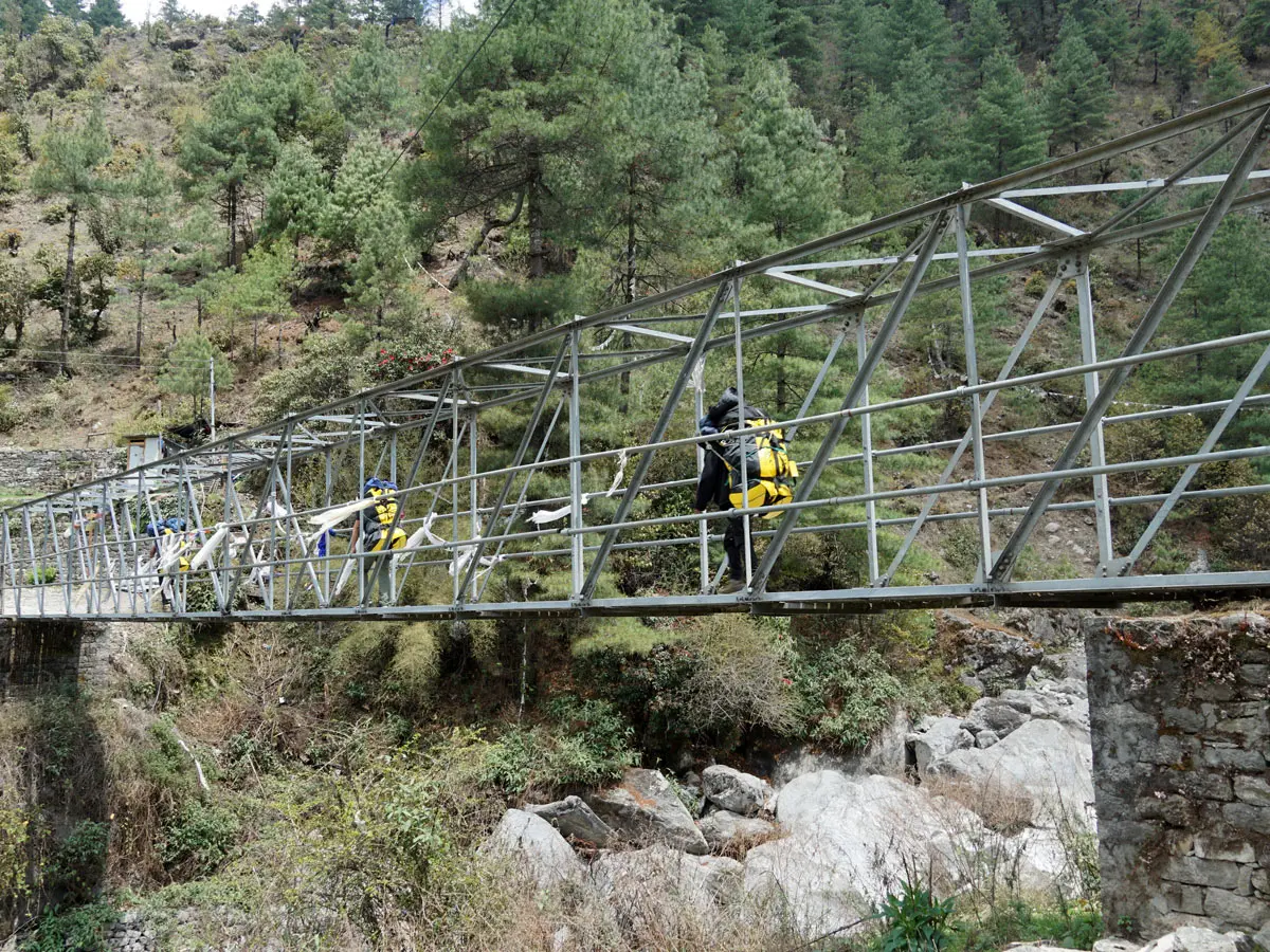 Crossing a bridge at Thado Koshi