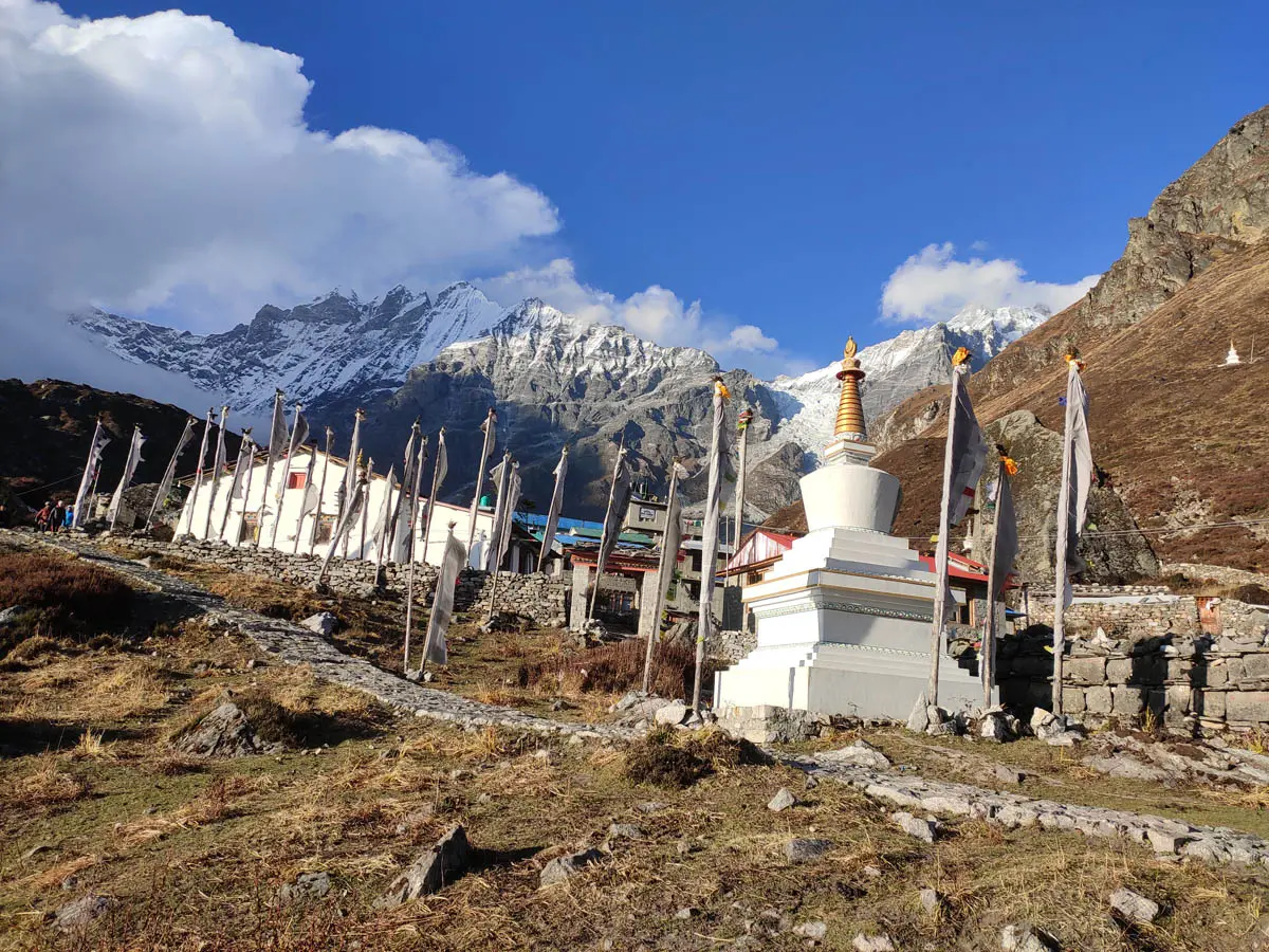 Kyanjin Gompa with prayer flags and stupa